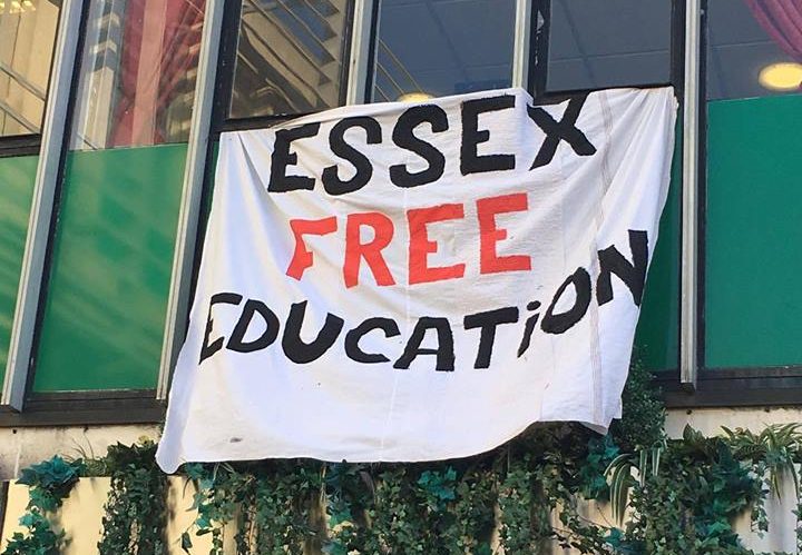 A large banner reading "Essex Free Education" hung from an SU office window.