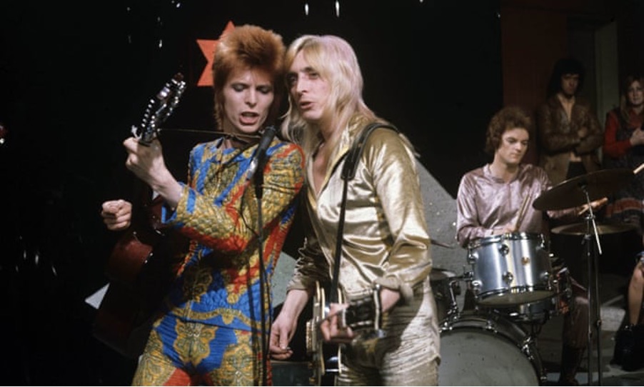 Bowie, with guitarist Mick Ronson on Top of the Pops in 1972.
